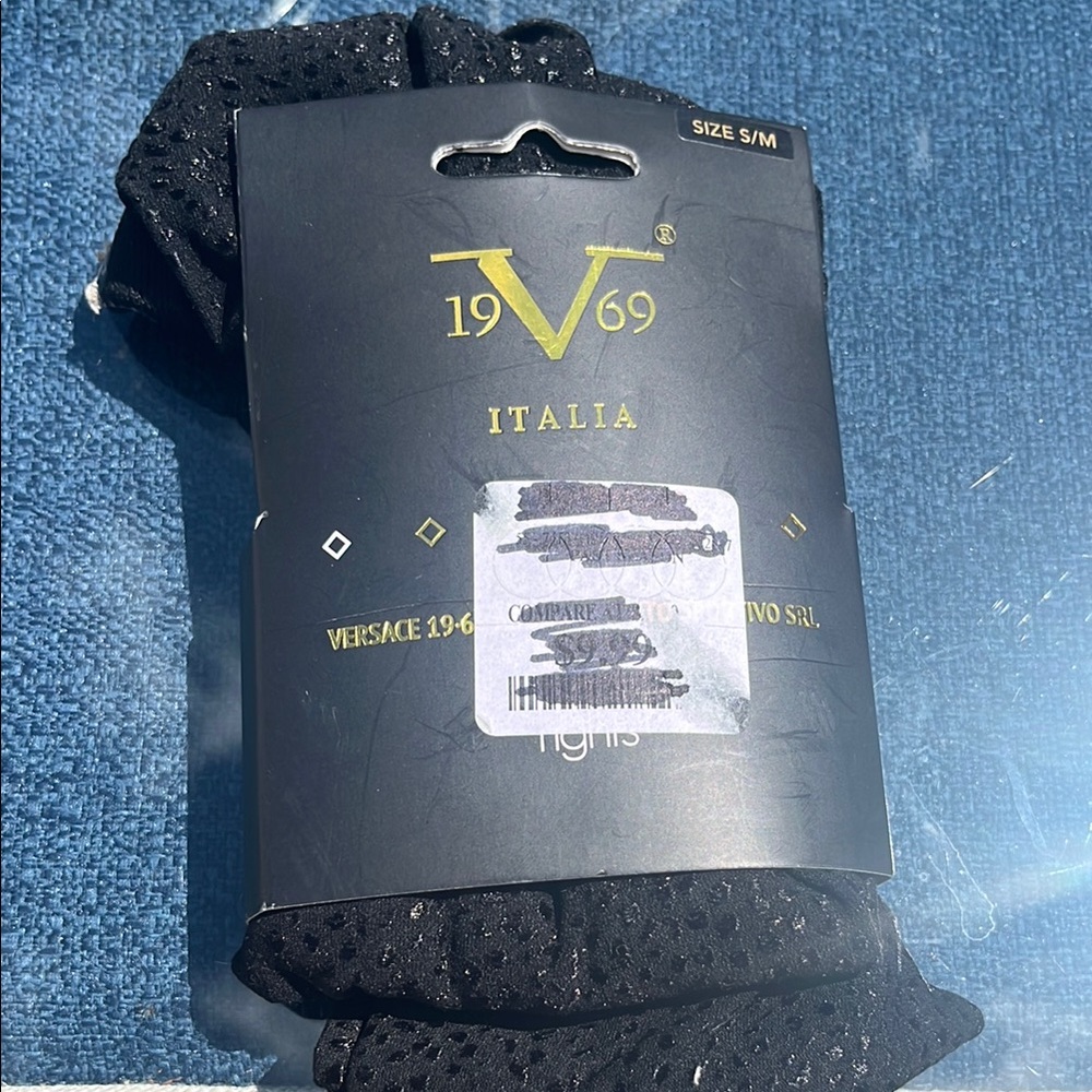 Versace. Black textured tights size small medium new tags.
